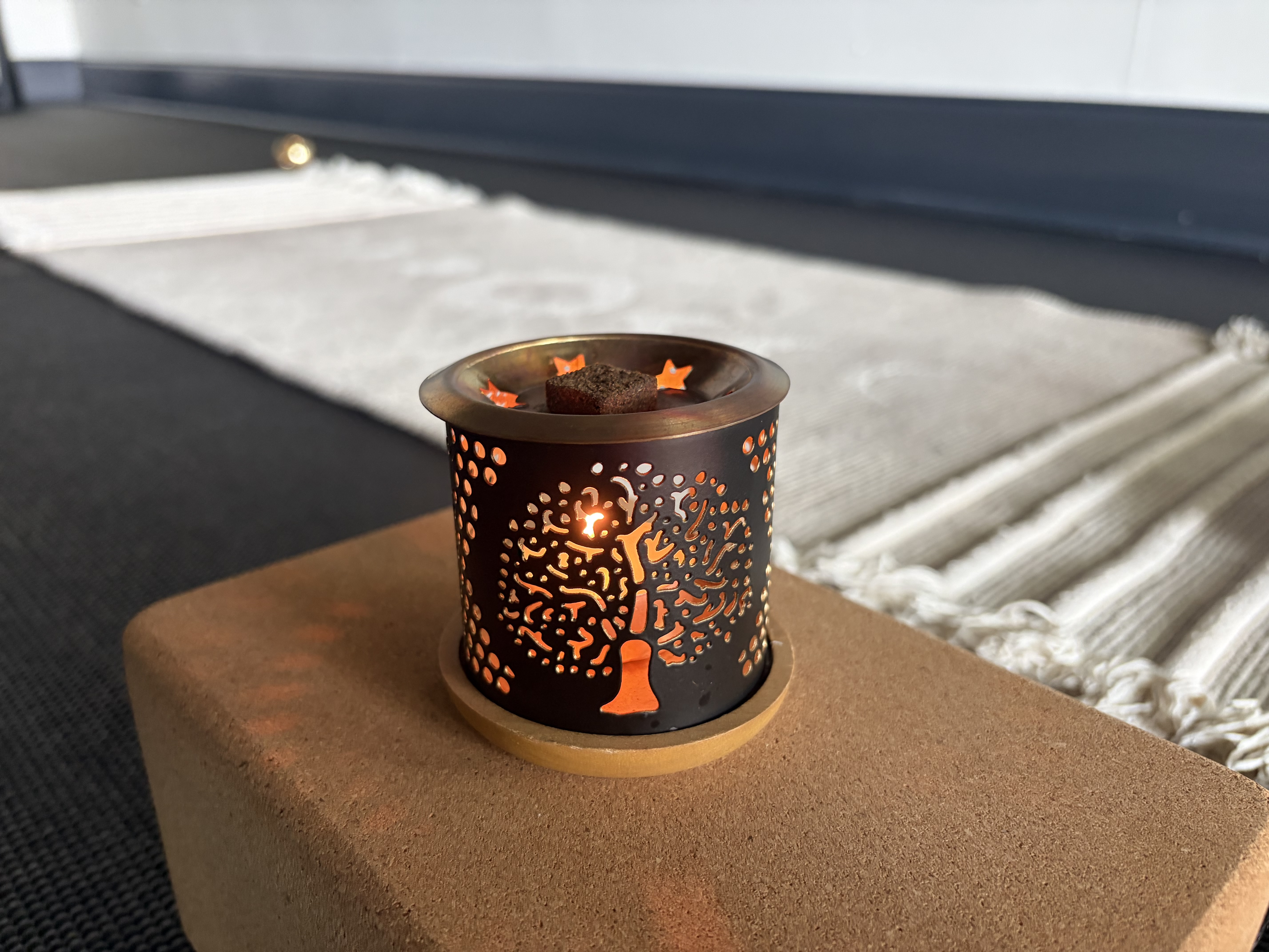 Peaceful studio with singing bowls at golden hour